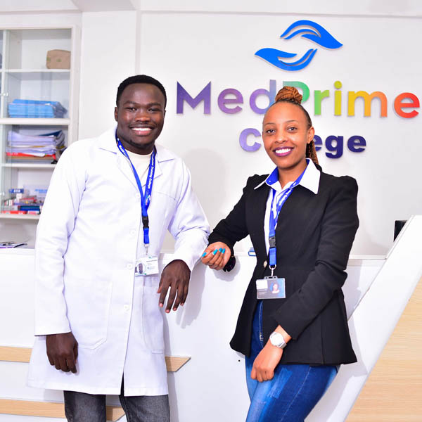 Two MedPrime staff members smiling