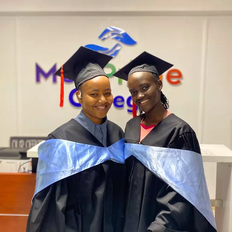 A group of MedPrime graduates celebrating at their graduation ceremony